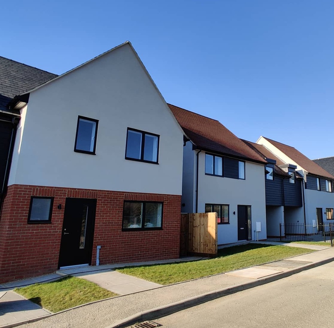 250 decarbonising new build dwellings development building compliance testing front elevation air testing